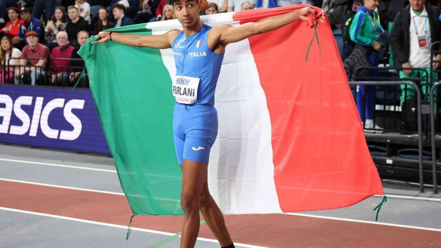 Se atleti italiani con la pelle scura sventolano il tricolore