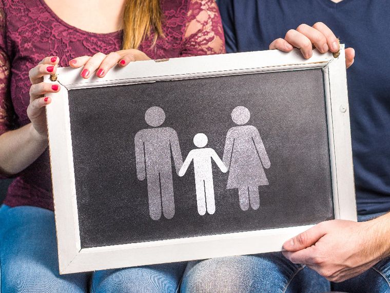 Una famiglia, su una lavagna