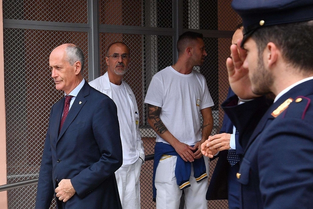 Il capo della Polizia Franco Gabrielli esce dall'ospedale San Martino di Genova dopo aver fatto visita ai due poliziotti delle volanti feriti nell'intervento di domenica scorsa, in cui un agente ha dovuto sparare uccidendo un giovane che stava accoltellando un collega