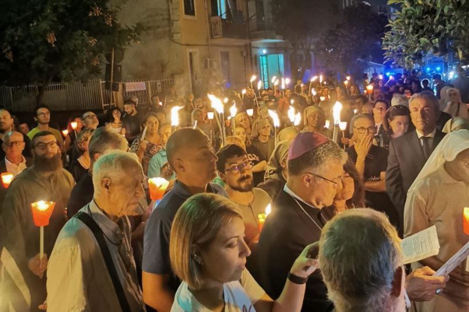 Un momento della fiaccolata a Palermo in ricordo di don Puglisi