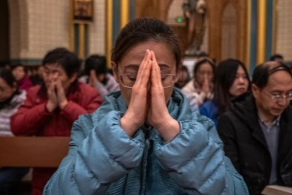Cattolici cinesi in preghiera