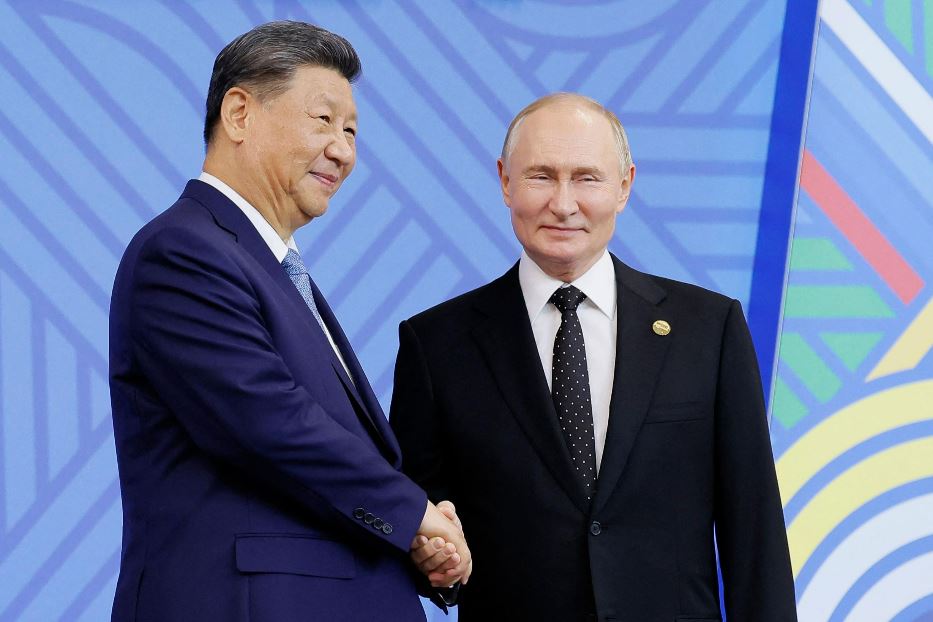 Vladimir Putin con Xi Jinping